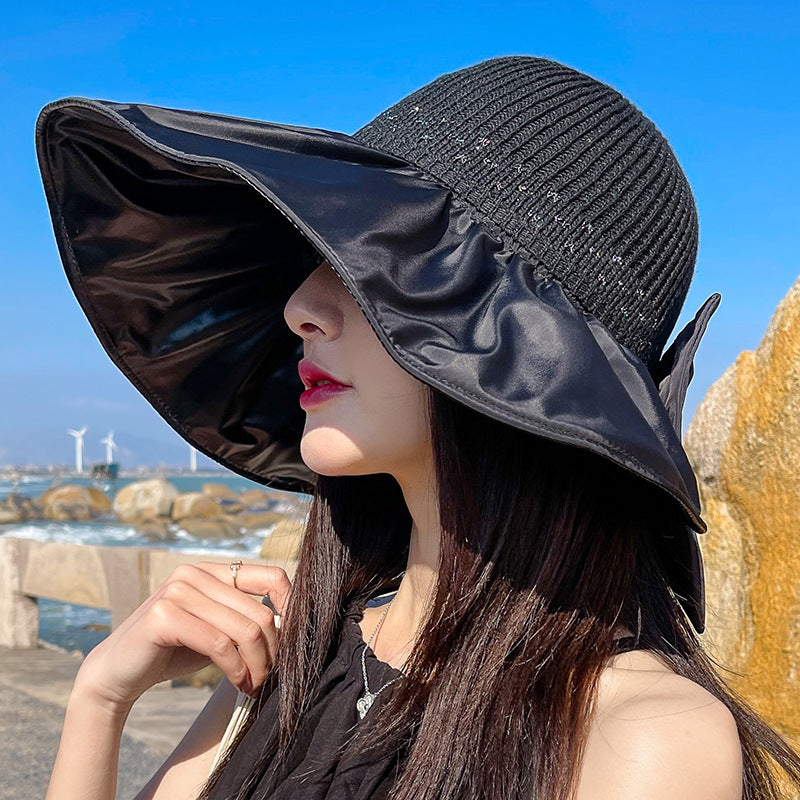 Women's Wide Brim UV Protection Sun Hat — Adjustable Beach Hat with Bow Detail