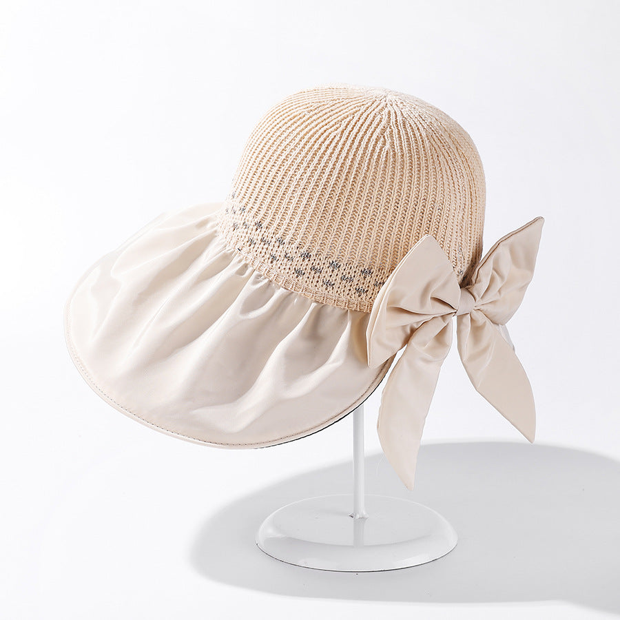 Women's Wide Brim UV Protection Sun Hat — Adjustable Beach Hat with Bow Detail