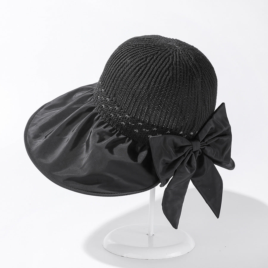 Women's Wide Brim UV Protection Sun Hat — Adjustable Beach Hat with Bow Detail