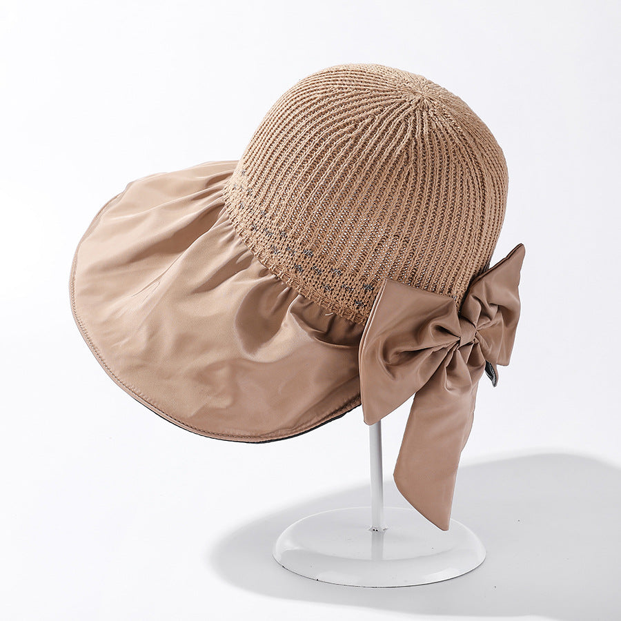 Women's Wide Brim UV Protection Sun Hat — Adjustable Beach Hat with Bow Detail