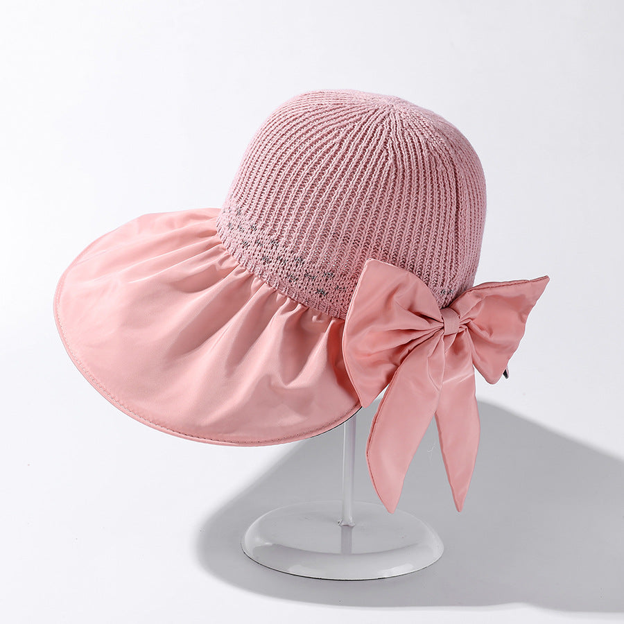 Women's Wide Brim UV Protection Sun Hat — Adjustable Beach Hat with Bow Detail