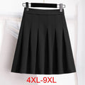 Plus size pleated A-line maxi skirt in black, sizes 4XL to 9XL