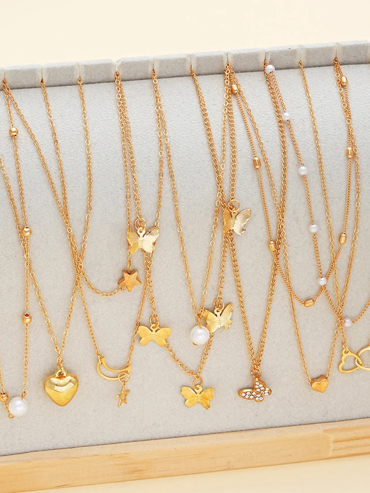 7-Piece Boho Gold Necklace Set — Layered Heart, Pearl & Cross Pendant Necklaces for Women