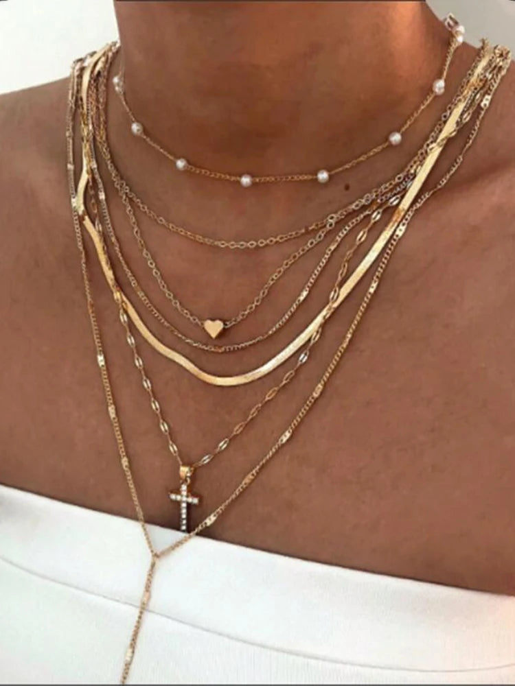 7-Piece Boho Gold Necklace Set — Layered Heart, Pearl & Cross Pendant Necklaces for Women